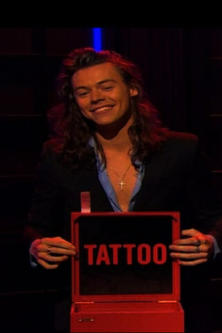 Harry Styles: The Charismatic Showman in Red