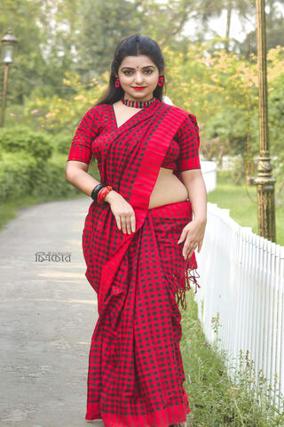 Elegance in Red: Rupsa Saha Choudhry's Traditional Charm