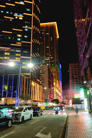 Neon Nights in Macao: A Vibrant Street Scene