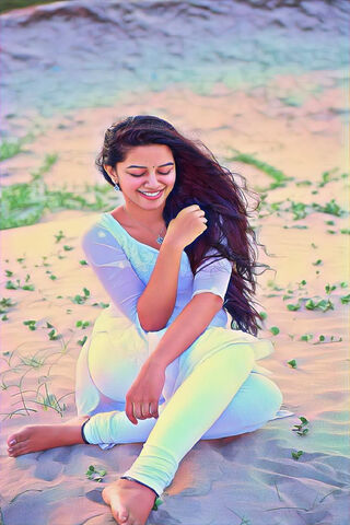 Serenity in Sand: Mirnalini's Blissful Moment 🌊✨