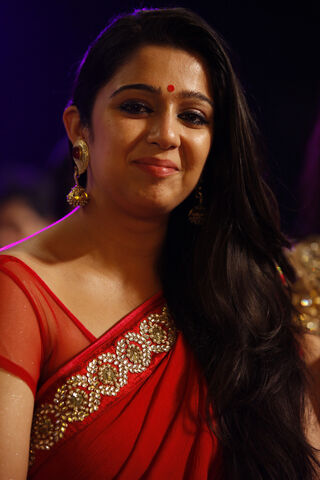 Elegance in Red: The Charm of Charmi Kaur