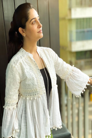 Elegance in White: A Moment of Reflection