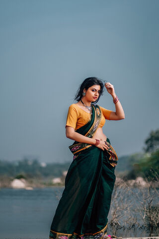 Sasha Singh: Elegance by the Riverbank 🌊✨