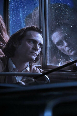 Reflections of Madness: The Joker's Solitude 🎭🌧️