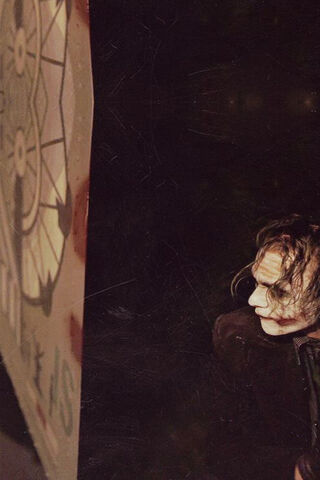 Behind the Mask: The Joker's Dark Reflection