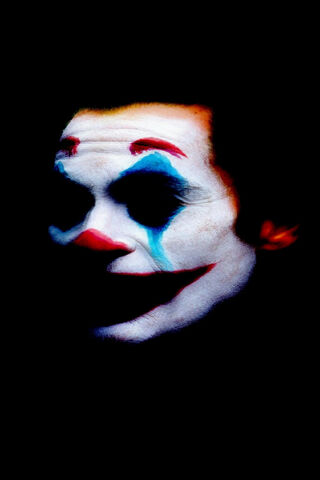 The Enigmatic Joker: A Dance of Shadows 🎭✨