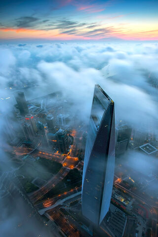 Skyward Dreams: The Shanghai Tower at Dawn 🌅🏙️