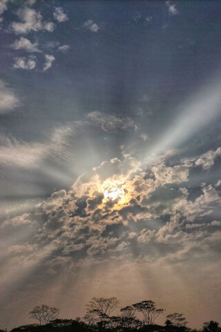Celestial Symphony: The Dance of Light and Clouds ☁️🌞