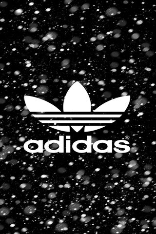 Adidas: The Iconic Three Stripes in a Winter Wonderland ❄️👟