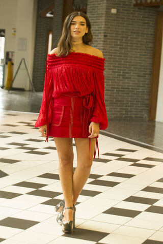 Dazzling in Red: A Fashion Icon's Statement