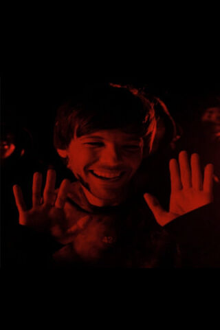 Louis Tomlinson: A Fiery Moment 🔥