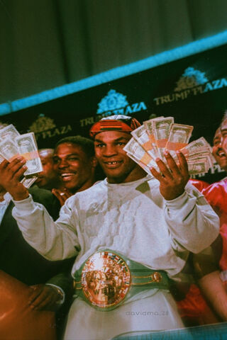The Champion's Glory: Mike Tyson Celebrates Victory! 🥊💰