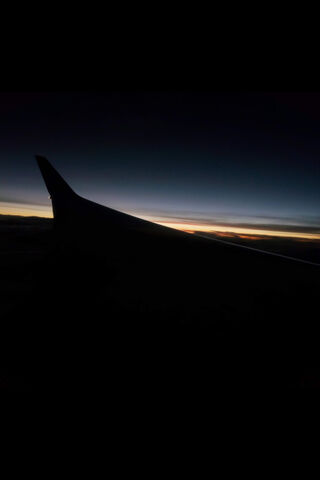 Skyline Serenity: A Journey into Dusk 🌅✈️