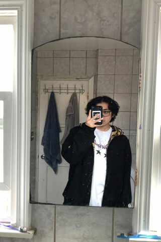 Cuco's Mirror Moment: A Reflection of Style