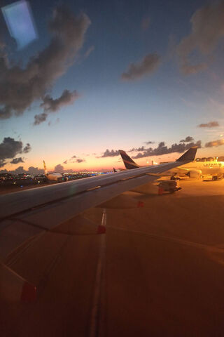 Sunset Soars: A Journey Begins 🌅✈️