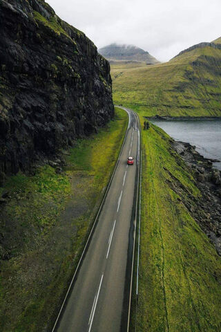 Journey Through the Majestic Faroe Islands 🌄🚗