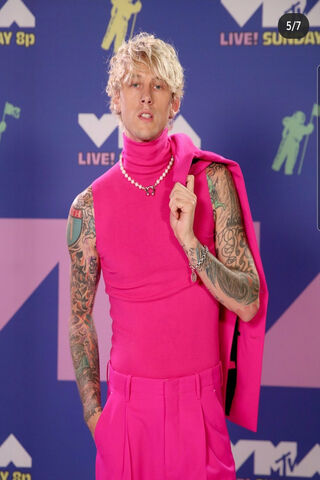 Bold in Pink: MGK's Daring Fashion Statement 🎤✨