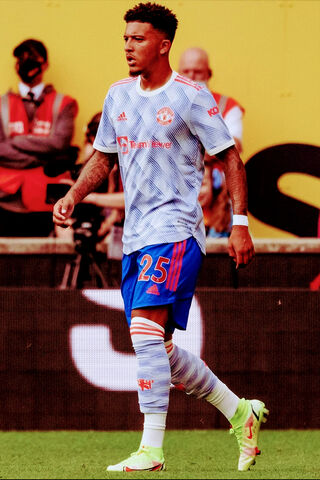 Sancho's Stellar Stride on the Field ⚽✨