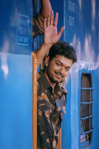 Thalapathy Vijay: The Charismatic Star on the Move! 🚂✨