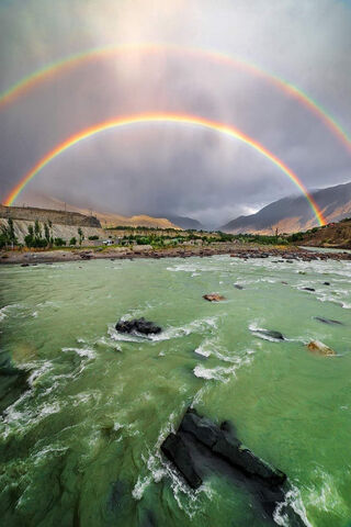 Double Rainbow Over Gilgit: Nature's Masterpiece 🌈🌊
