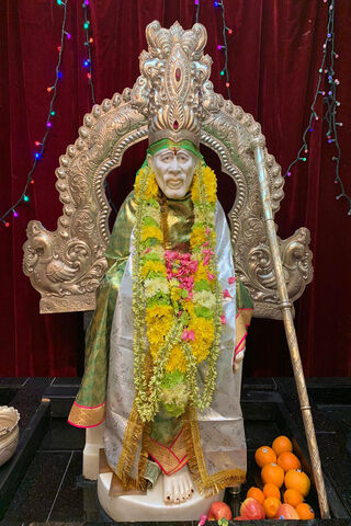 Divine Presence: The Blessings of Sai Baba 🌼🙏