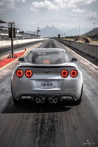 Corvette: The Silver Bullet on the Track! 🚗💨