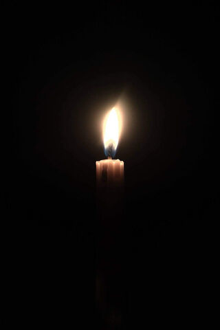Illuminating Serenity: The Dance of a Flame