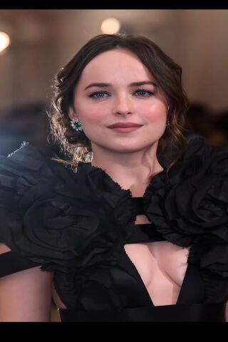 Elegance in Black: Dakota Johnson's Stunning Red Carpet Look