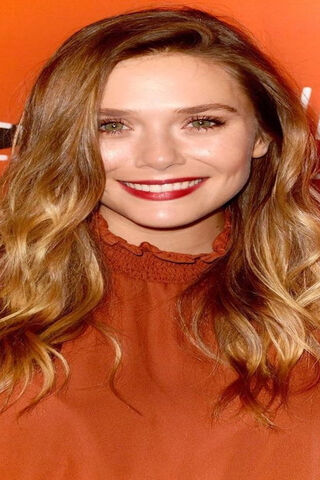 Radiant Charm: Elizabeth Olsen Shines Bright