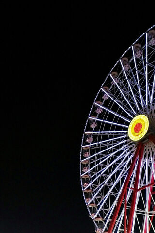 Nighttime Whirl: The Ferris Wheel's Glow 🎡✨