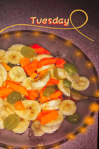 Tasty Tuesday: A Colorful Fruit Chaat Delight! 🍌🍊🍇