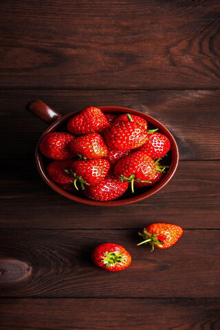 Sweet Harvest: A Bowl of Fresh Strawberries 🍓