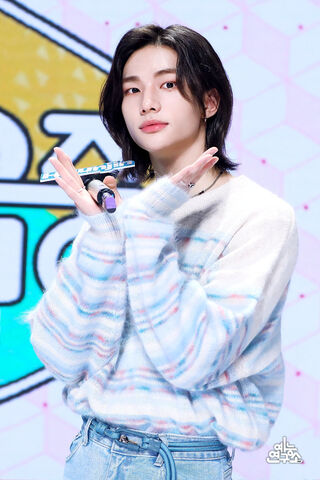 Hyunjin's Effortless Charm with Long Locks ✨