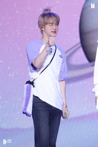 Jin's Charming Stage Moment 🌟