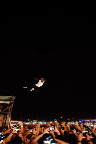 Soaring to New Heights: Lil Uzi Vert's Epic Stage Dive! 🎤✨