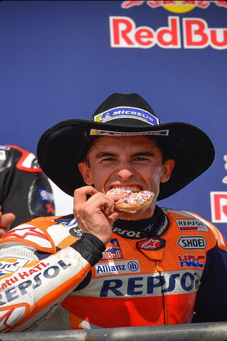Sweet Victory: Marc Marquez Celebrates with a Donut! 🍩🏍️