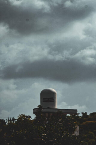 Mystical Shivling Under the Clouds 🌥️✨