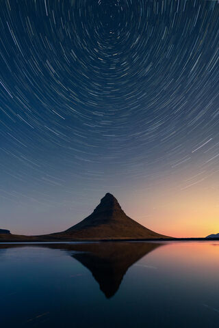 Celestial Dance Over Kirkjufell 🌌✨