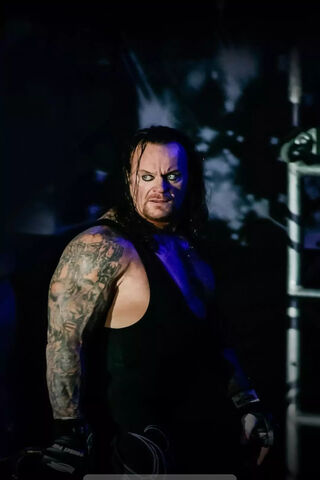 The Phenom Rises: A Glimpse of the Undertaker 🕯️💀