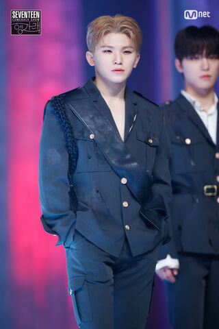 Fearless Charisma: Woozi Takes the Stage 🌟