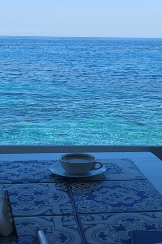 Sipping Serenity: A Coffee by the Sea ☕🌊