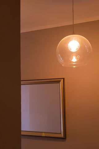 Illuminated Balance: A Dance of Light and Reflection