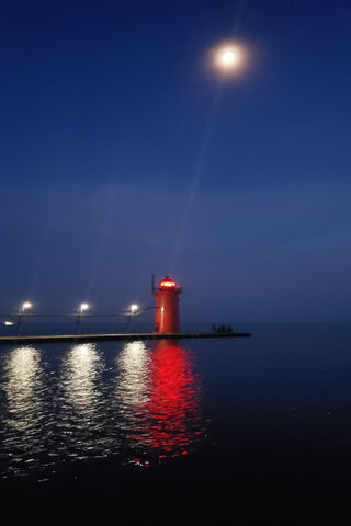 Guiding Light: S Haven Lighthouse at Dusk 🌙🏮