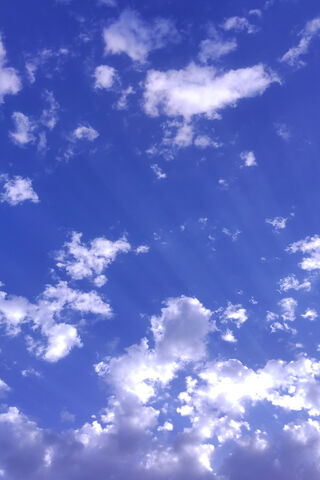 Heavenly Blue: A Dance of Clouds ☁️🌤️