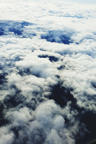 Heavenly Whispers: A Dance of Clouds