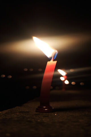 Flickering Hopes: The Dance of a Candle Flame