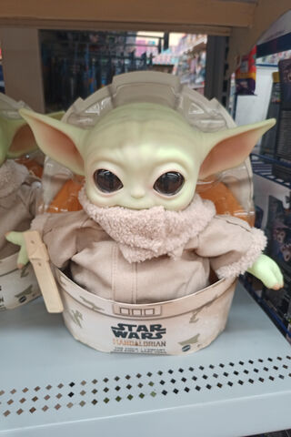 The Adorable Force: Baby Yoda in Action! 🌌✨