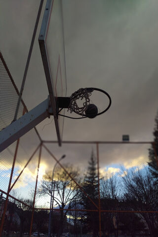 Slam Dunk Dreams: A Basketball Court at Dusk 🏀🌅