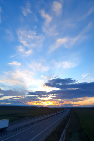 Chasing Clouds: A Journey at Dusk ☁️🌅