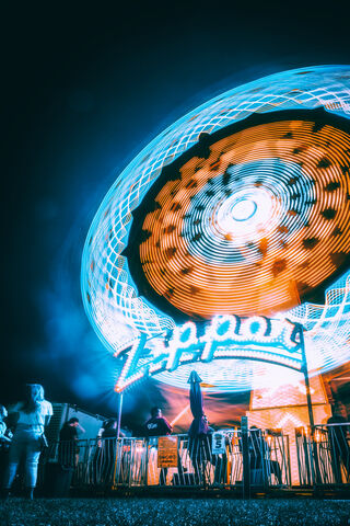 Whirling Lights: The Magic of the Ferris Wheel 🎡✨